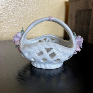 Small vintage glazed ceramic basket with a lattice pattern and dimensional flower details