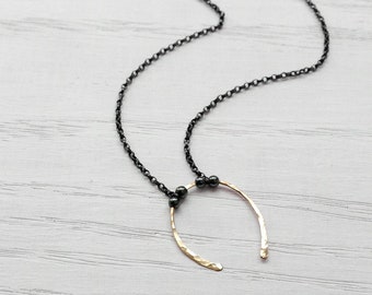 Collier porte-bonheur fer à cheval en argent sterling et hématite rempli d'or 14 carats