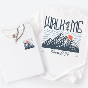 LDS Youth Theme Cotton ShirtLDS Girls Camp ApparelLDS Faith WearQuality ConstructionInspirational Message DesignComfortable Daily WearUnisex StyleMultiple Size Options AvailableSun Ray PatternMountain GraphicsBeautiful Design