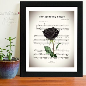 May include: A black and white sheet music print with the title "New Speedway Boogie" and a black rose with green leaves in the center. The music is by Jerry Garcia and the words are by Robert Hunter.