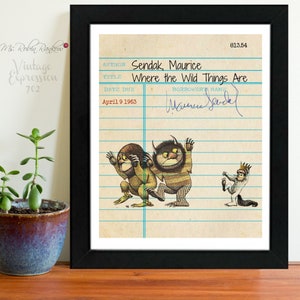May include: A vintage library card with a black frame. The card has a title, "Where the Wild Things Are" by Maurice Sendak. The date due is April 9, 1963. The card has a signature from Maurice Sendak.