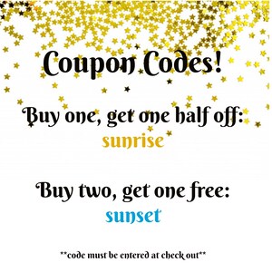 May include: A white background with gold stars scattered across the top. The text "Coupon Codes!" is in black. The text "Buy one, get one half off: sunrise" is in black with the word "sunrise" in gold. The text "Buy two, get one free: sunset" is in black with the word "sunset" in blue. The text "**code must be entered at check out**" is in black.