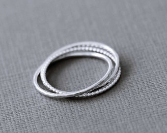 Sterling Silver Interlocking Ring with bead wires.