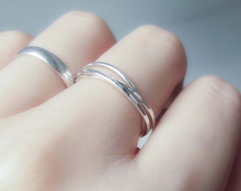 Handmade sterling silver interlocking ring, thin rolling rings