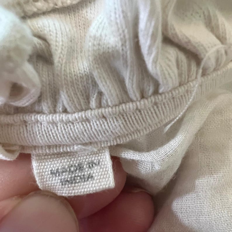 Camicetta Anthropologie color crema in cotone con ricami in pizzo, bottoni e peplo, taglia XS immagine 9