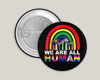 Button “We’re all human” – Anti-racism button, equality, diversity, solidarity, badge
