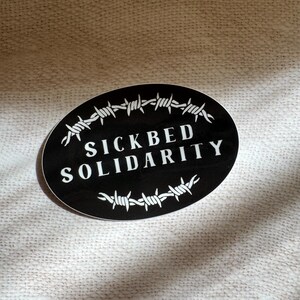 SICKBED SOLIDARITY | Oval Vinyl Sticker | Disability Pride | Black and White | Gloss Finish with protective coating image 3