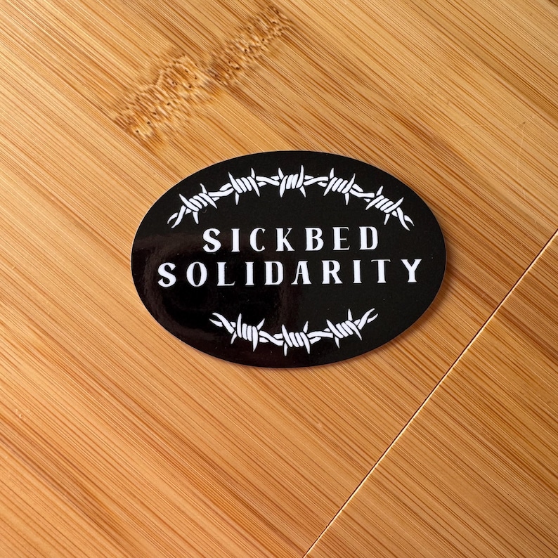 SICKBED SOLIDARITY | black and white, barbed wire, oval sticker on wood