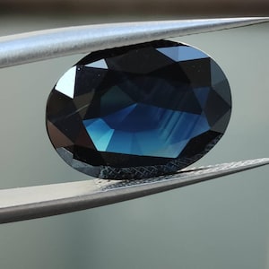 9.87ct. Deep Blue Sapphire, Oval Cut Unheated, Certified