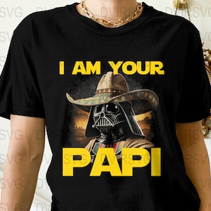 May include: Black t-shirt with a graphic of Darth Vader in a sombrero. The yellow text reads "I AM YOUR PAPI". The design includes a sunset backdrop, creating a unique fusion.