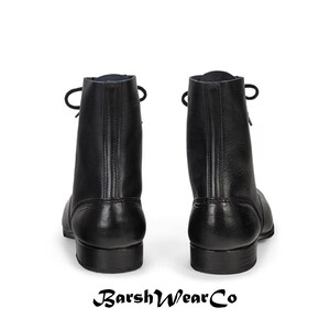May include: A pair of black leather ankle boots with laces. The boots have a rounded toe and a small heel. The brand name "BarshWearCo" is printed at the bottom of the image.