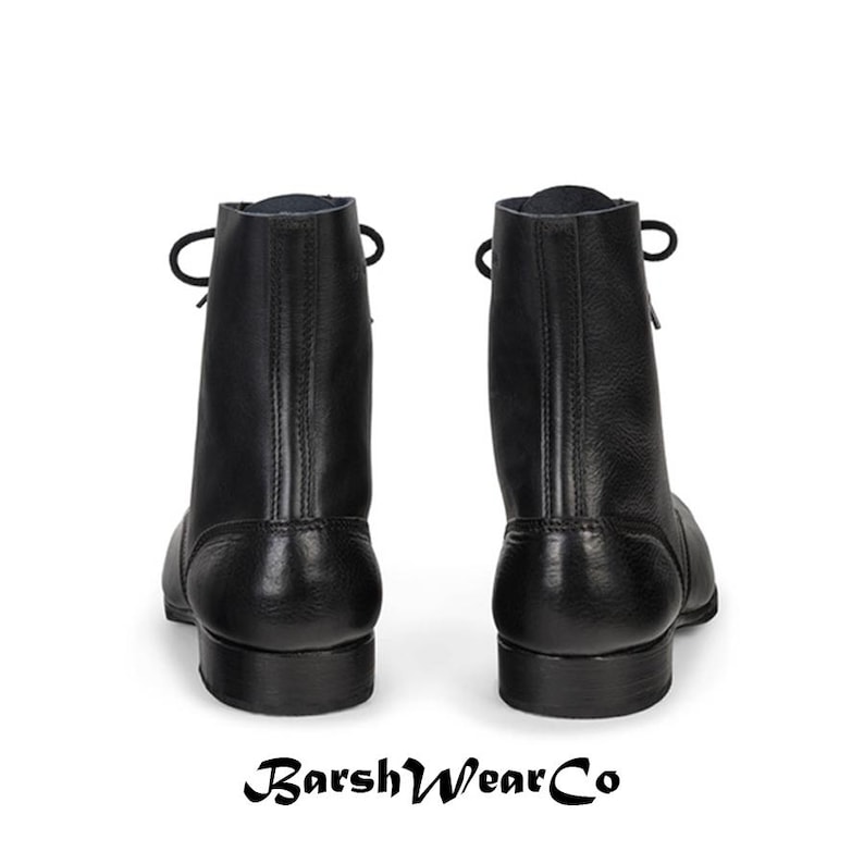 May include: A pair of black leather ankle boots with laces. The boots have a rounded toe and a small heel. The brand name "BarshWearCo" is printed at the bottom of the image.