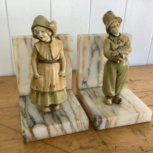 Antique Bookends Marble w Dutch Boy Girl Metal Celluloid Face Figures Rare