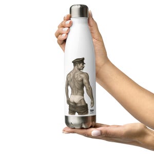 May include: White insulated water bottle with a silver cap and base. The bottle features a sepia-toned illustration of a man in a cap and briefs. The illustration is a detailed drawing of the man's back and shoulders.
