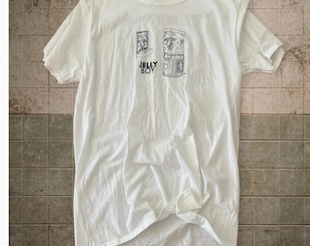 Surreal “Jelly Boy” Graphic T-Shirt – White Cartoon Illustration Tee – Indie Pop Art Style T-Shirt