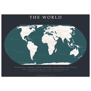 May include: A world map print featuring a dark charcoal background with cream-colored continents. The text reads THE WORLD at the top, with additional details at the bottom including POLITICAL MAP, COUNTRIES, CAPITALS AND OCEANS, EQUAL EARTH PROJECTION, EQUAL AREA, FAVRIC, PATTERSON & JENNY, 2018, ENDORSED BY THE UN GENERAL ASSEMBLY - SEPTEMBER 2016.