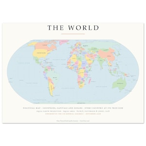 May include: A world map print titled THE WORLD featuring an equal-area projection. The map displays countries in pastel colors against a light blue ocean background. Text includes political map details, projection information, and credits.