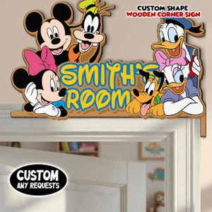 May include: Wooden corner sign featuring Mickey Mouse, Minnie Mouse, Goofy, Donald Duck, Daisy Duck, and Pluto. The sign reads "Smith's Room" in blue and yellow lettering. The sign also has the text "Custom Shape Wooden Corner Sign" and "Custom Any Requests".