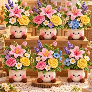 May include: Six crocheted flower arrangements in white pots with smiling faces, pink cheeks, and brown feet. Each pot contains a variety of colorful yarn flowers including pink lilies, yellow roses, purple lavender, and small white daisies with green leaves.