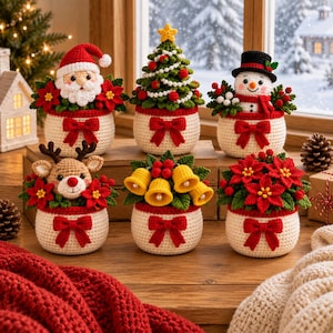 May include: Six crocheted Christmas decorations in cream-colored pots with red bows. The figures include Santa Claus, a decorated tree, a snowman, a reindeer, yellow bells, and red poinsettia flowers, all featuring intricate yarn details.