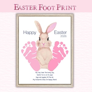 May include: Framed Easter-themed artwork featuring a watercolor bunny and pink footprints. The text reads "Happy Easter 2026" and includes a poem about Easter fun. The frame is light brown.