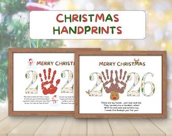 May include: Two framed prints titled CHRISTMAS HANDPRINTS. One features a red handprint between the numbers 2026, with a snowman and poem. The other shows brown handprints forming a reindeer shape between 2026, with a poem. Both have wooden frames.