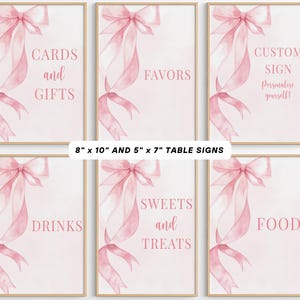 Pode incluir: Conjunto de seis placas de mesa emolduradas com um design de laço e fita rosa em aquarela. O texto inclui "Cartões e presentes", "Lembrancinhas", "Placa personalizada", "Bebidas", "Doces e guloseimas" e "Comida". As placas medem 20,3 x 25,4 cm e 12,7 x 17,8 cm.