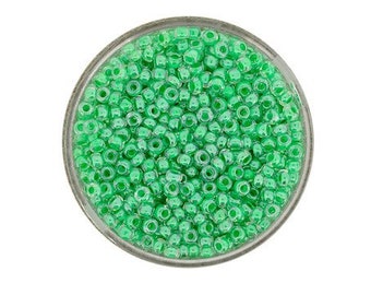 Size 9/0 glass seed beads in colourlined green 17 grams