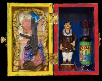 Machine gun snail potion, Hand-made icon box with found treasures.