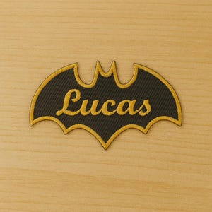 Personalized embroidered bat patch with name – superhero-style iron-on patch, yellow embroidery on black