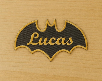 Personalized embroidered bat patch with name – superhero-style iron-on patch, yellow embroidery on black