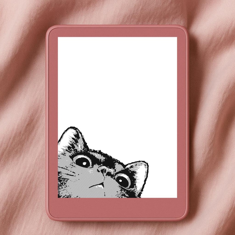 Op de afbeelding: Een roze e-reader toont een zwart-wit illustratie van een kat die over de bovenkant kijkt. De ogen van de kat zijn wijd met een verraste uitdrukking. De e-reader staat tegen een roze stoffen achtergrond.