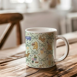 May include: White ceramic mug featuring a repeating pattern of Winnie the Pooh characters, bows, and balloons on a light green background. The design includes Pooh Bear with a cake, tigers, and other characters.