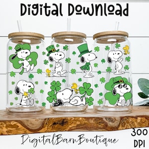 May include: Three clear glass tumblers with bamboo lids and straws, featuring Snoopy in St. Patrick's Day attire with green shamrocks. The text "Digital Download" is at the top, and "Digital Barn Boutique" is at the bottom.