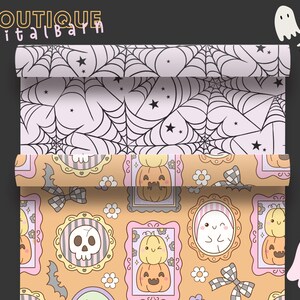 May include: Rolled Halloween-themed paper with a spiderweb design and a pattern of pumpkins, ghosts, and skulls. The paper has a light pink and orange color scheme, with the text "BOUTIQUE Digital Barn" at the top.