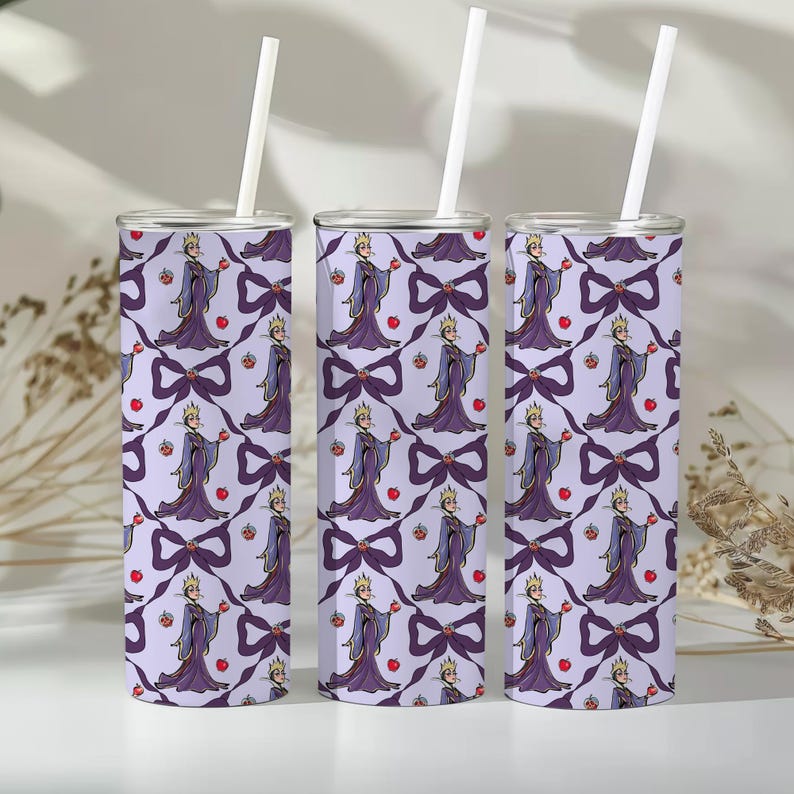 May include: Three stainless steel tumblers with white straws. Each tumbler features a repeating pattern of a purple Evil Queen holding an apple, with purple bows and red apples on a light purple background.