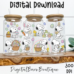 May include: Three glass tumblers with wooden lids and straws, featuring Snoopy and Woodstock Easter designs. Each tumbler has a different Snoopy and Woodstock Easter graphic. The words "Digital Download" and "Digital Barn Boutique" are printed on the image.