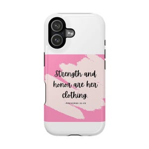May include: White phone case with a pink and white design. The case features the quote "Strength and honor are her clothing" in black script, with "-PROVERBS 31:25" below. The phone case has a dual-camera cutout.