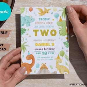 May include: A colorful dinosaur-themed birthday invitation with the text "TWO" in large yellow letters. The invitation includes illustrations of various dinosaurs, balloons, and palm trees. The text reads "Please join us to celebrate Daniel's second birthday!" with the date and time.
