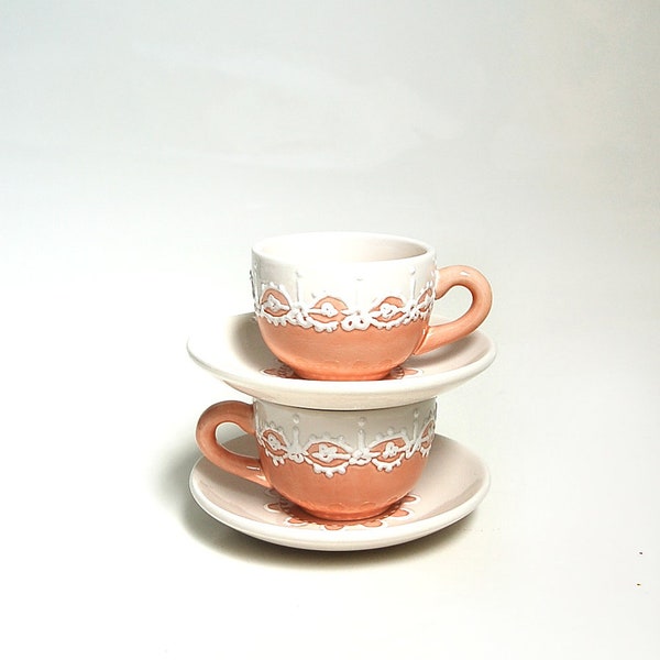 Small teacups with peach shabby chic style