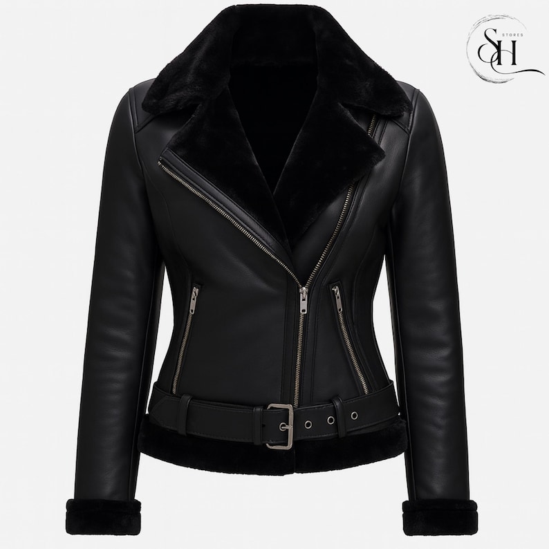 May include: Black leather jacket with a faux fur collar and lining. The jacket features a belted waist, zippered pockets, and cuffs with faux fur trim. The jacket has a classic biker style.