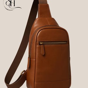 Bolso bandolera de piel marrón: bolso de viaje unisex.