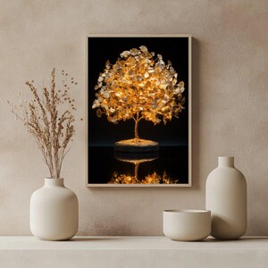May include: A framed artwork featuring a golden tree sculpture with a dark background. The tree has a detailed trunk and a full canopy of golden leaves. The artwork is displayed on a shelf with neutral-toned vases and a bowl.