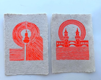 Set van 2 linoleumsneden uit Berlijn – Handgemaakte tv-toren en Oberbaum-brug, neonoranje Berlijnse muurdecoratie, handgedrukt op handgemaakt papier, Berlijns cadeau