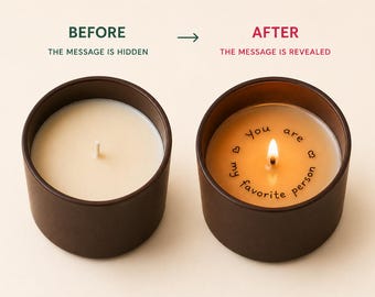 May include: A dark brown candle in a cylindrical container. The left side shows the candle unlit with a white wax surface. The right side shows the candle lit, revealing the text "you are my favorite person" with small heart icons in the wax.
