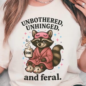 Unbothered, Unhinged, and Feral PNG – Funny Raccoon Sublimation Clipart – Feral Funnies Graphic for Shirts, Mugs – Digital Download PNG