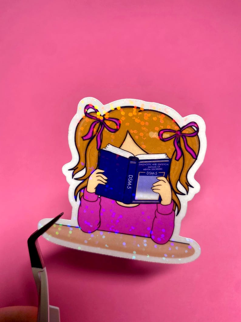 Girl reading and studying DSM-5 sticker featuring a cute girl wearing pink with bows in her dirty blonde hair, psychology humor sticker for grad students and therapists