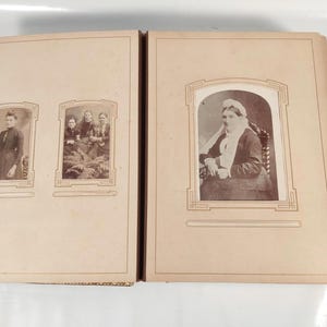 Victorian photo album with   Carts de Visite  or Cabinet Cards