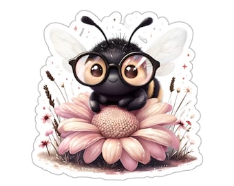May include: A sticker featuring a cute cartoon bee wearing glasses, perched on a pink flower. The bee has a black body with yellow stripes and large, expressive eyes. The flower is surrounded by small plants and a white background.