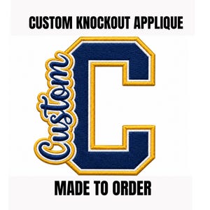 May include: An embroidered knockout applique featuring a large navy blue block letter C with a white and gold border. The word Custom is written in a gold and navy blue script font along the left side. Text reads CUSTOM KNOCKOUT APPLIQUE and MADE TO ORDER.